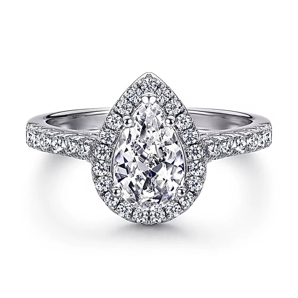 1.0CT pear-shaped halo engagement-style ring with eternity band